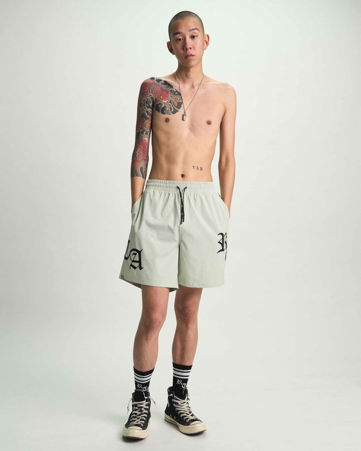 MARK SWIM TRUNK | LIGHT TEAL OLD ENGLISH RTA